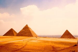 Pyramid Charts - Three pyramids in the desert.