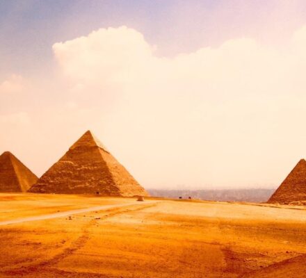 Pyramid Charts - Three pyramids in the desert.